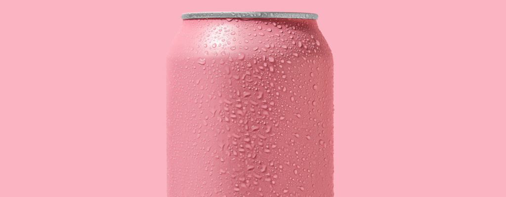 A THC-infused drink in a pink can sits in front of a pink background