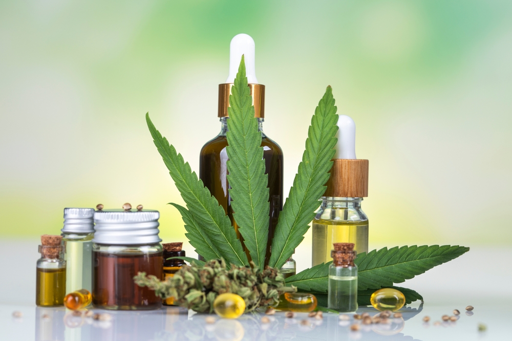 A variety of cannabinoid products shown sitting on a table.