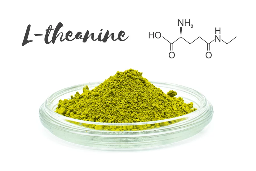 A photo illustration showing the chemical formula for L-theanine and green tea powder.